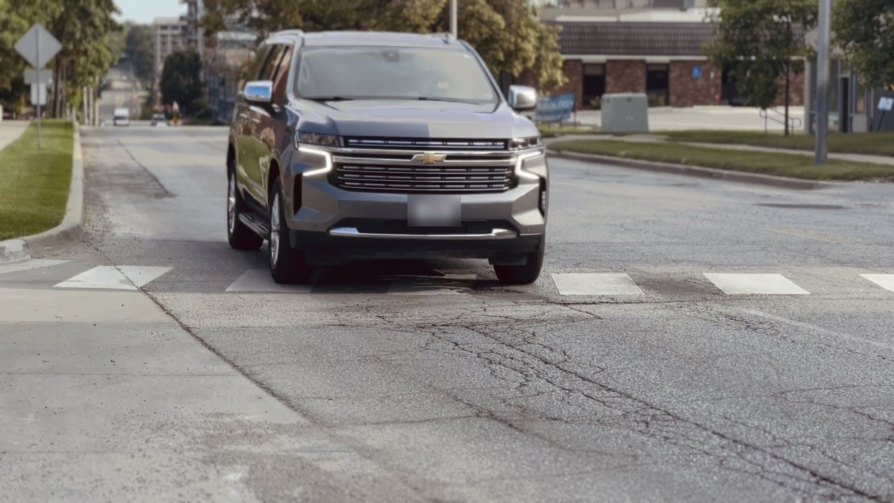 Chevrolet Suburban at a crosswalk